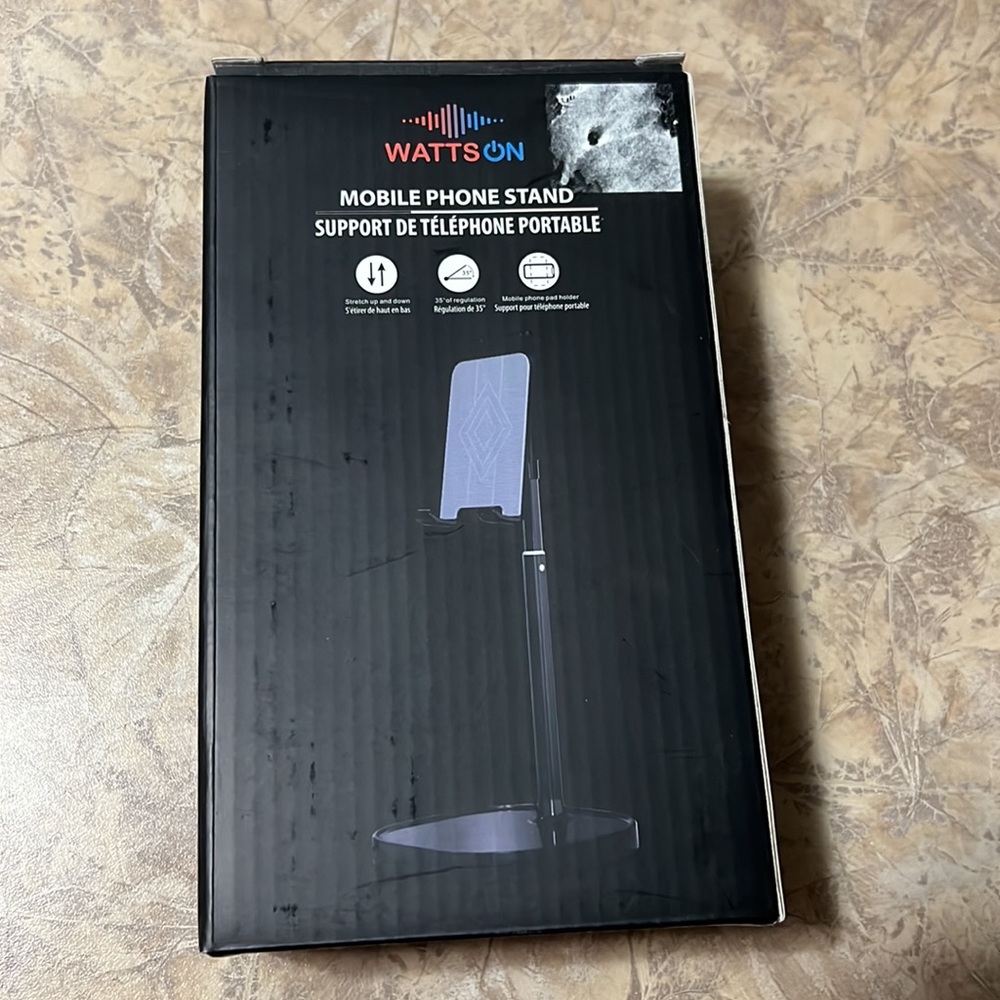 Useful stand for any cell phone or iPad / tablet